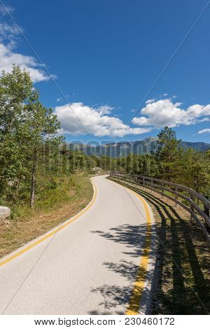 Bicycle Path In The Sarca Valley (valle Del Sarca) Through The Forest. Trentino Alto Adige, Italy, E