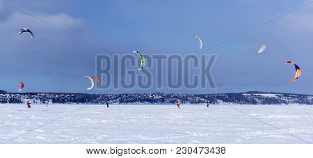 Perm, Russia - March 09, 2018: Snowkiters Rides On The Ice Of The Kama Reservoir