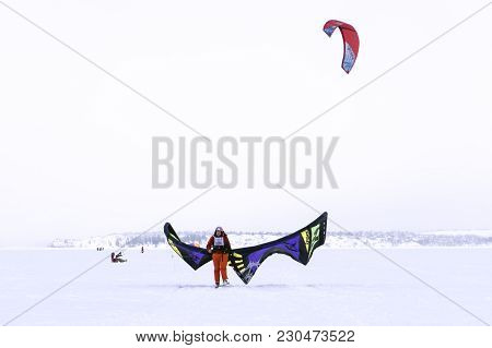 Perm, Russia - March 09, 2018: Snowkiters Rides On The Ice Of The Kama Reservoir
