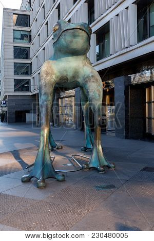 Madrid, Spain - January 21, 2018: Statue Of A Frog And Cera Museum At Paseo De La Castellana Street 