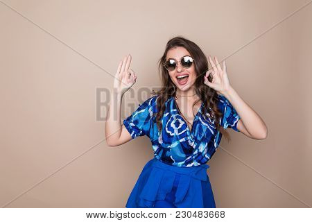 Pretty Young Sexy Fashion Sensual Woman Posing On Color Wall Background. Stylish Fashionable Blonde
