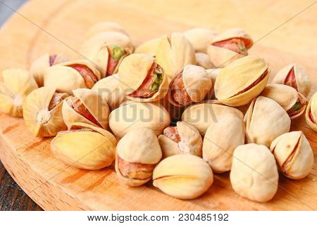 Dish Full Of Pistachios With More Pistachios On Side
