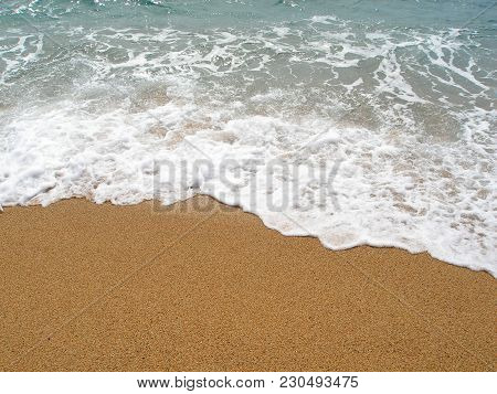 Wave On Sand. Beach And Warm Sea