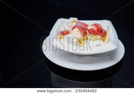 Strawberry Ice Cream On The White Plate
