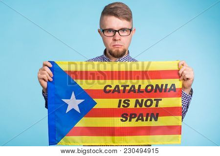 Man With Pro-independence Flag. Referendum For The Separation Of Catalonia From Spain Concept.