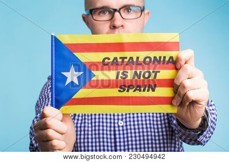 Man With Pro-independence Flag. Referendum For The Separation Of Catalonia From Spain Concept.