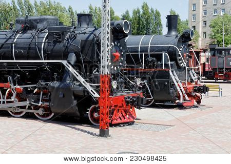 Kharkiv, Ukraine - June 5, 2017: Old Black Steam Locomotives Fd20-2560 And Er774-40 In The Khark