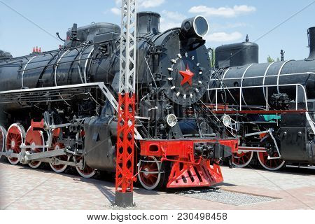 Kharkiv, Ukraine - June 5, 2017: Old Black Steam Locomotives Fd20-2560 And Er774-40 In The Khark