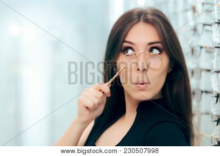 Woman Looking To Replace Old Lorgnette Glasses With New Pair