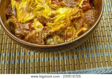 Chicken Enchilada Skillet - Skillet With Torn Corn Tortillas, Cooked Chicken, Zesty Tomatoes And Sau