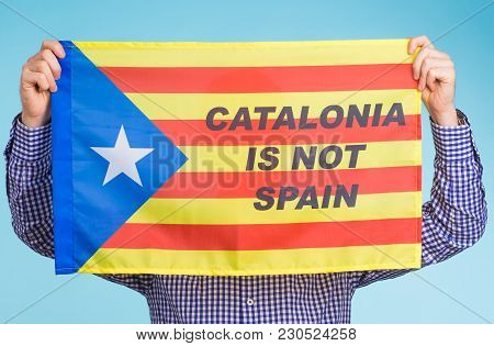 Man With Pro-independence Flag. Referendum For The Separation Of Catalonia From Spain Concept.