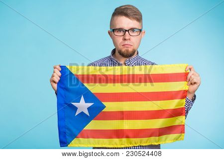 Man With Pro-independence Flag. Referendum For The Separation Of Catalonia From Spain Concept.