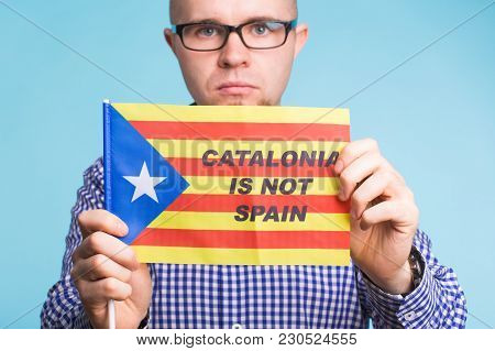 Man With Pro-independence Flag. Referendum For The Separation Of Catalonia From Spain Concept.