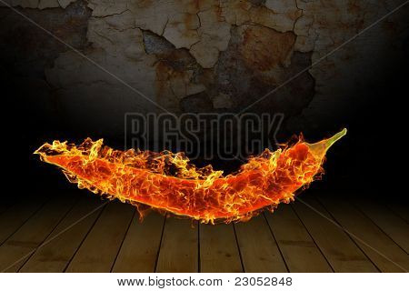 Rode chili peper branden op de achtergrond