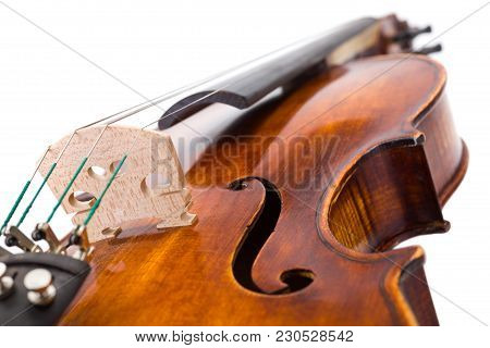 Close View Of A Violin Strings And Bout Isolated On White