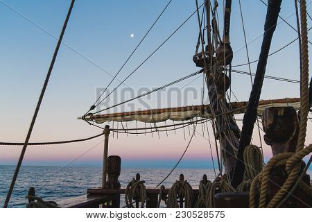 Seascape From The Side Of An Old Wooden Sailboat