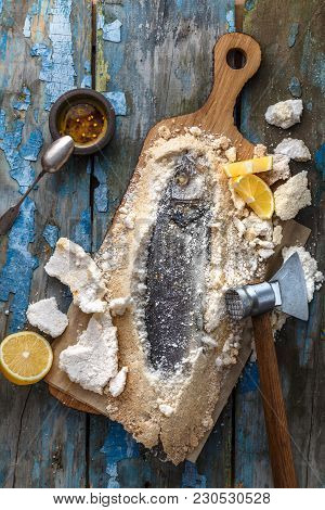 Fish Baked In Salt With Lemon And Oil, Deadpan Style, Rustic, Top View