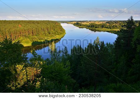The Largest River In Lithuania Nemunas Flowing Through Green Forests In Summer