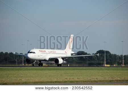 Amsterdam, The Netherlands  - August, 18th 2016: Ts-imm Tunisair Airbus A320-211 
Taking Off From Po