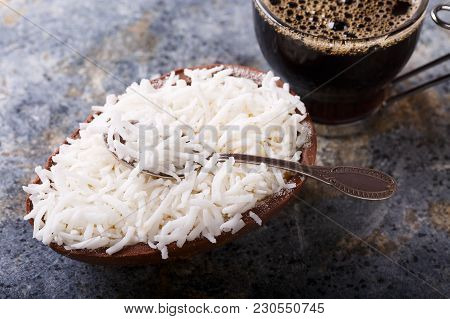 Chocolate Egg With Filling For Easter On Wooden Background