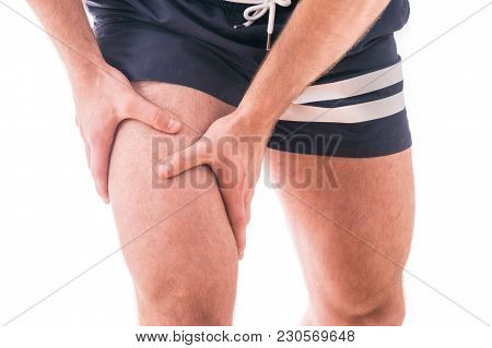 Man With Quadriceps Pain Over White Background