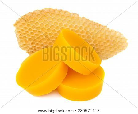 Pieces Of Natural Beeswax And A Piece Of Honey Cell Are Isolated On A White Background. Beekeeping P