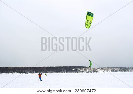 Perm, Russia - March 09, 2018: Snow Kiters Rides On The Ice Of A Frozen River