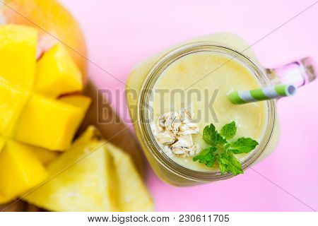 Mango, Banana, Pineapple And Oatmeal Smoothie In The Jar