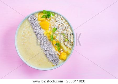 Mango, Banana, Pineapple And Oatmeal Smoothie In The Bowl