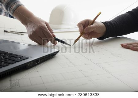 Architects Working On Blueprint. Architects Workplace - Architectural Project, Blueprints, Ruler, Ca