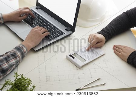 Architects Working On Blueprint. Architects Workplace - Architectural Project, Blueprints, Ruler, Ca