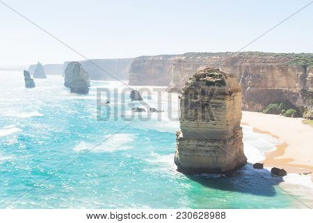 Cliffs And Twelve Apostels, Beach With Backlight The Great Ocean Road, Victoria, Australia