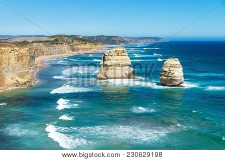 Two Of Twelve Apostels With Blue Ocean And Cloudless Sky At The Great Ocean Road, Victoria, Australi