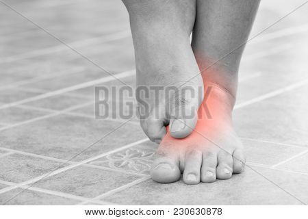 Close Up Man Scratch The Itchy Feet By Other Foot At Home. Healthcare And Medical Concept.
