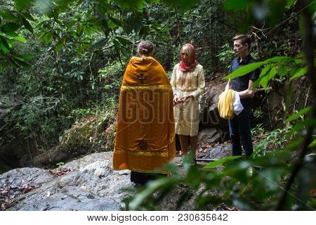 KOH CHANG, THAILAND - MAR 9, 2018: During Christian sacrament of spiritual birth - Baptism. There are currently 10 Orthodox parishes in Thailand, Orthodoxy is practiced by 0.002% of population.