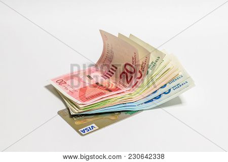 Nahariyya, Israel, March 09, 2018 : Israeli Money Stack Of New Israeli Banknotes Of Different Value 