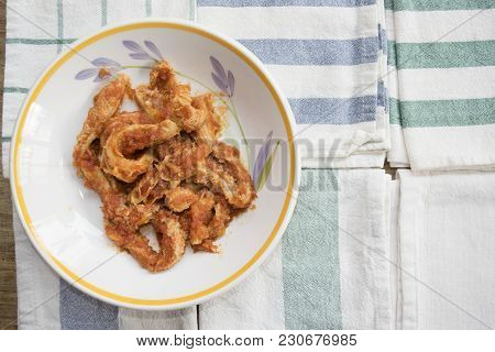 Roman-style Tripe With Tomato Sauce In A Dish On Some Colored Napkins