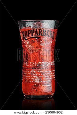 London, Uk - March 10, 2018 : Cold Glass Of Kopparberg Premium Cider  On Black Background.