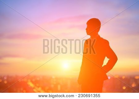 Silhouette Of Business Man Look Somewhere With Sunset