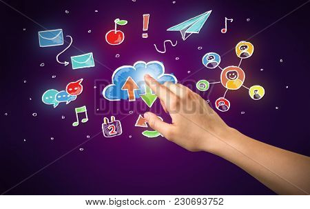 Female hand toucing mixed media icons with purple background