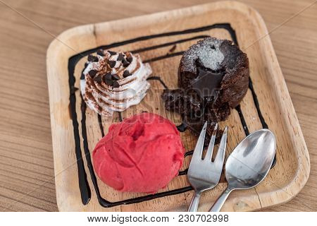 chocolate lava cake with ice cream and chocolate sauce