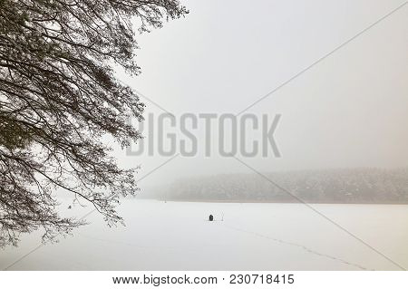 Belarus, Grodno, Molochnoe Lake. Winter Fishing Fishermen On Ice