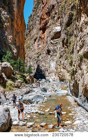 Crete, Greece, May 26, 2016: Tourists Hike In Samaria Gorge In Central Crete, Greece. The National P