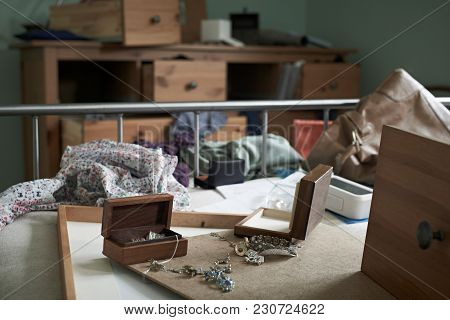 Empty Bedroom With Possessions Scattered During Burglary