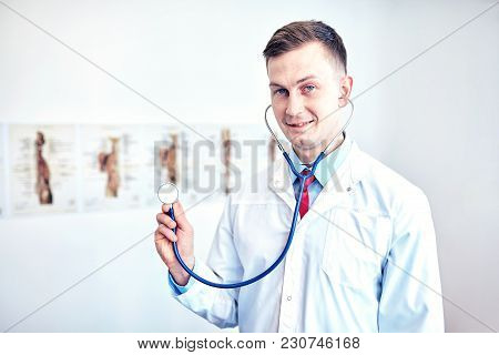 Close-up Of A Doctor In Front Of A Bright Background