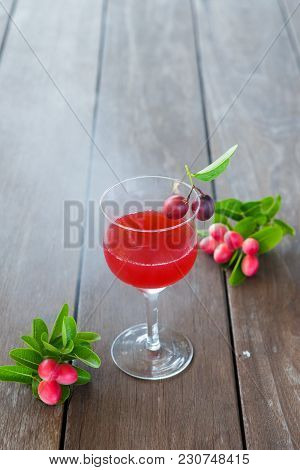 The Red Juice Of Ancient Thailand Name Carunda Or Karonda (carissa Carandas L.), Thai Herb Juice.
