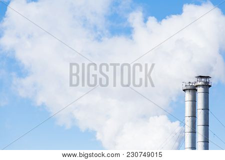 The Smoke From The Chimneys Of The Chp. Pollution Of The Environment. Environmental Disaster. Blue S