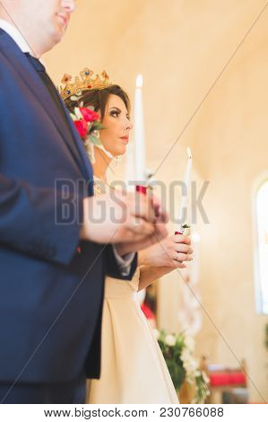 Wedding Couple Bide And Groom Get Married In A Church.