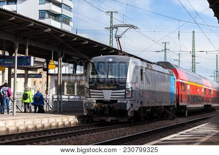 Fuerth / Germany - March 11, 2018: Re Regional Express Train From Deutsche Bahn Passes Train Station