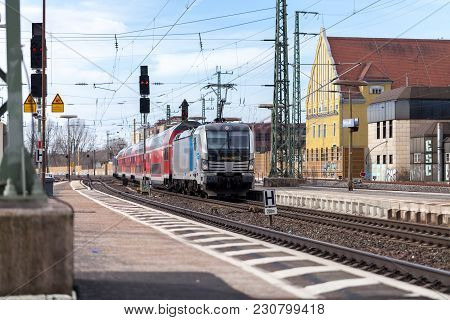 Fuerth / Germany - March 11, 2018: Re Regional Express Train From Deutsche Bahn Passes Train Station